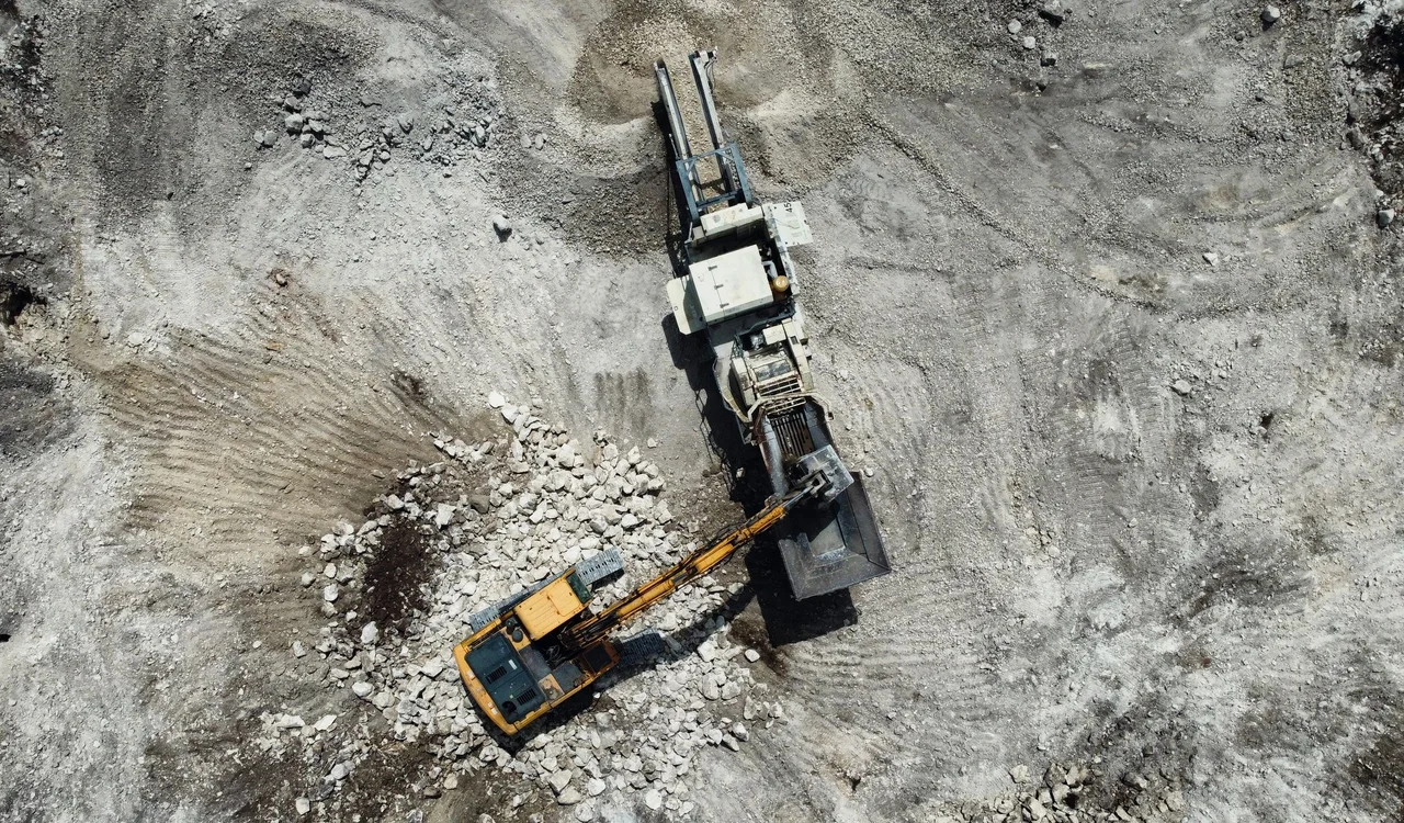 Overhead view of heavy equipment working at a quarry